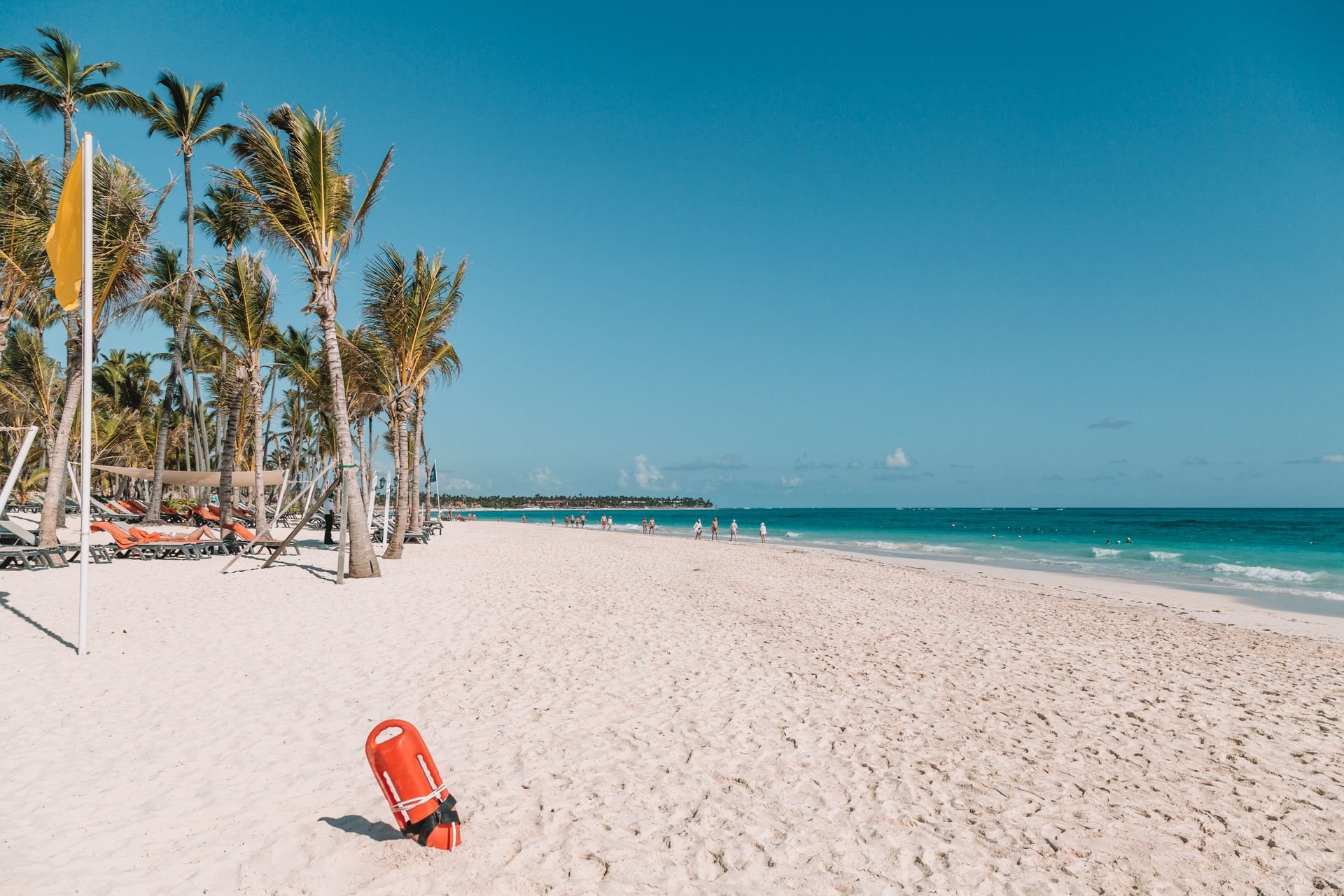Beachfront in Punta Cana, Dominican Republic, with palm trees and white sand