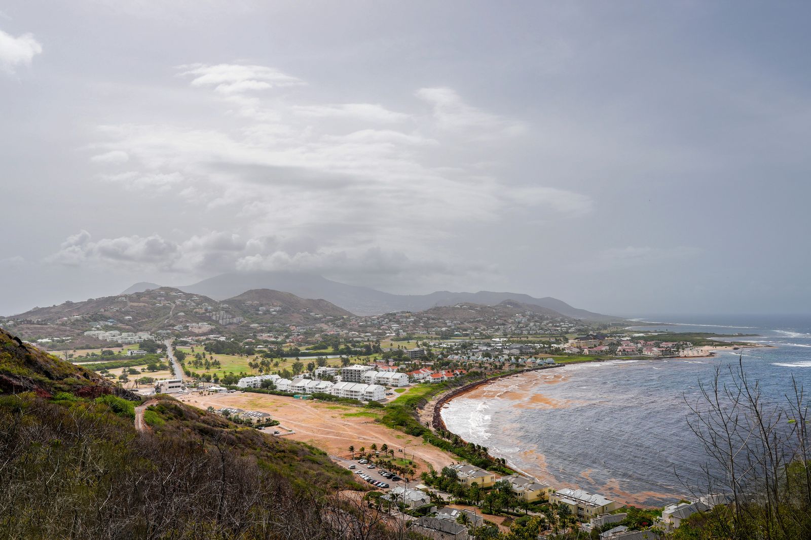 Hills and coastline of St Kitts seen from above