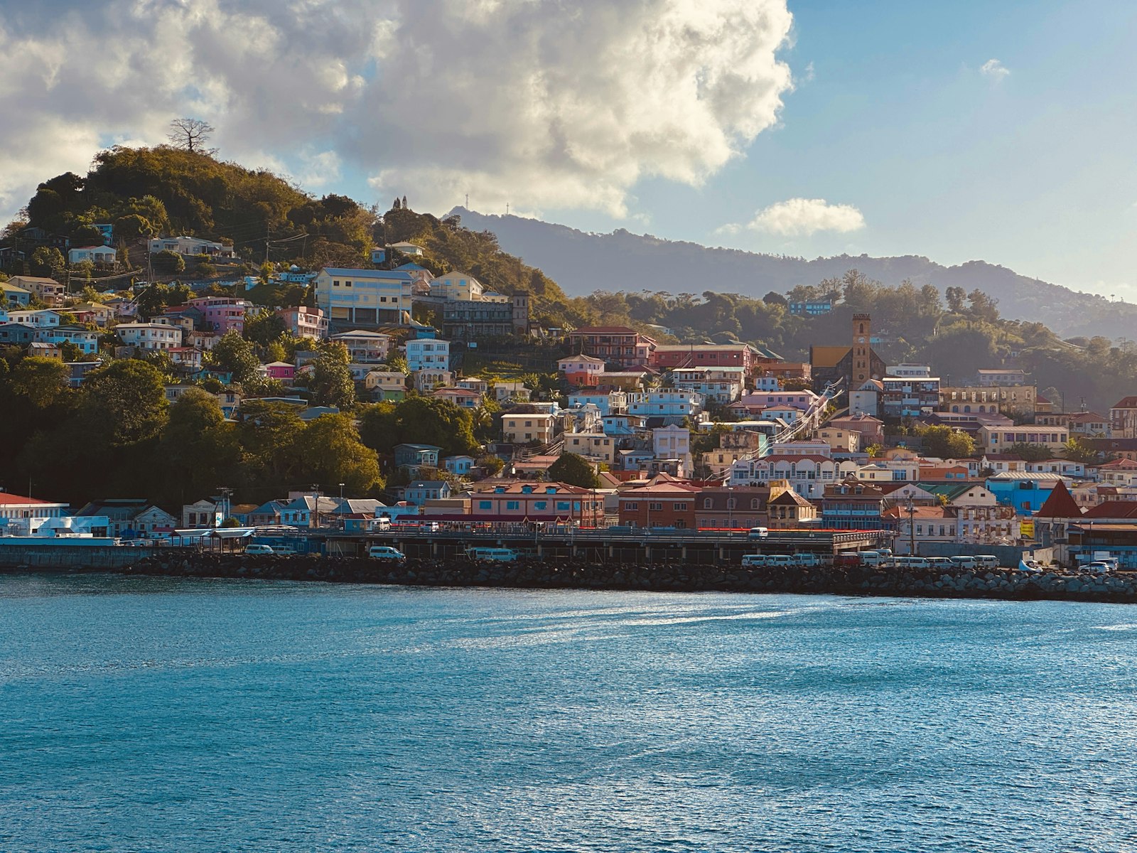 Hillside buildings above the harbour in St George's, Grenada