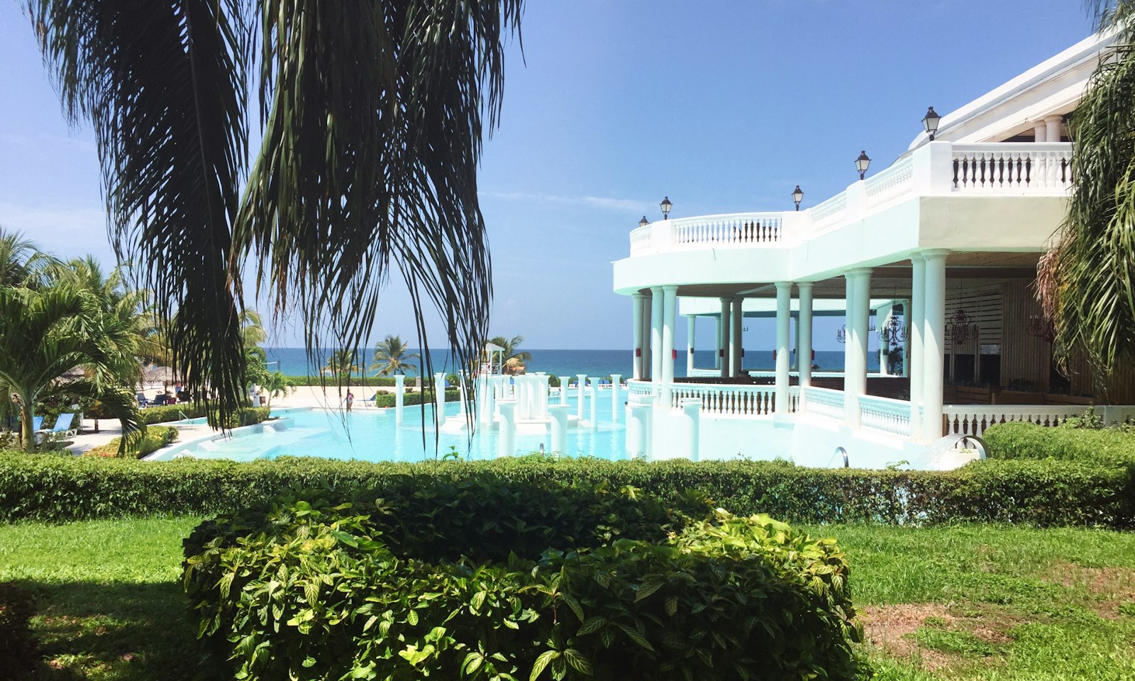 White villa-style building with a pool and sea view, Montego Bay, Jamaica