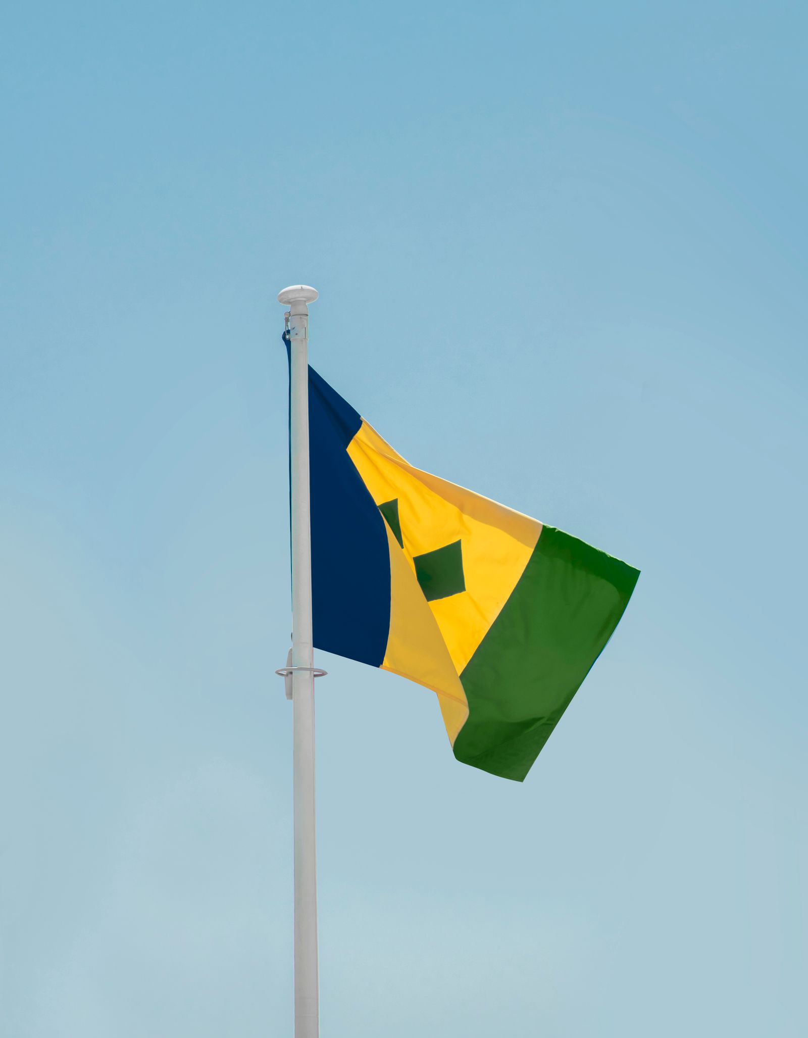 Flag of St Vincent and the Grenadines flying in Kingstown
